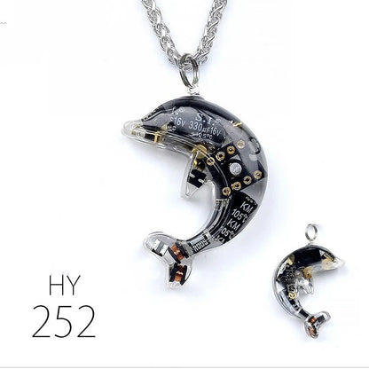 Steampunk-inspired dolphin pendant necklace with electronic components and brass accents