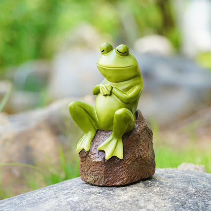 Charming resin figurine of a thoughtful, contemplative frog in a realistic pose, perfect for home or garden decor