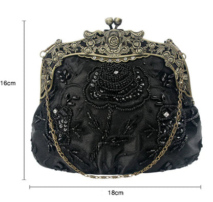 A black cosmetic bag with exquisite bead embroidery, featuring a silk surface and nylon fabric texture for a luxurious feel.