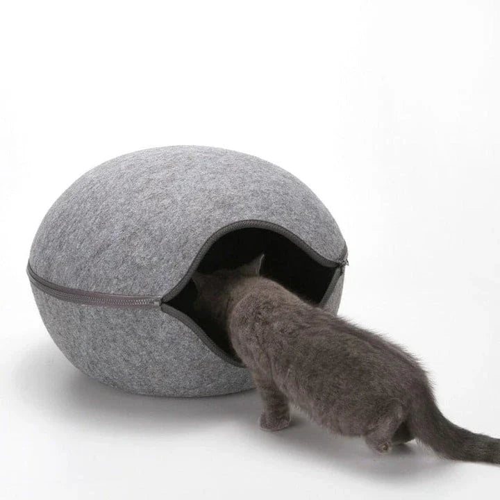 Cosy and comfortable egg-shaped pet bed with plush, supportive padding for your furry friend's relaxation