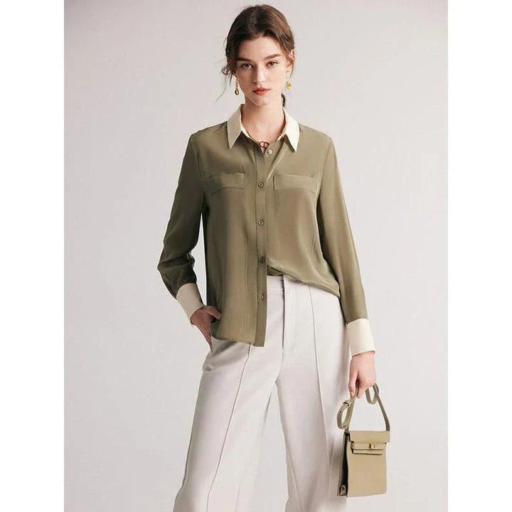 A chic and elegant silk crepe de chine blouse in a timeless solid pattern, perfect for professional and casual wear.