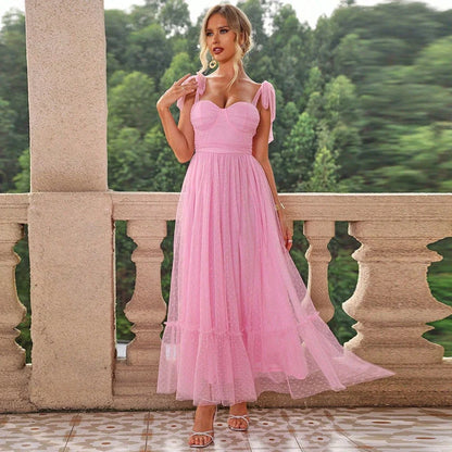Enchanting fairy-style dress with flowing silhouette, delicate lace accents, and mid-length skirt in a classic black colour