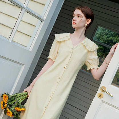 Elegant navy blue sailor collar dress with delicate fungus-edged sleeves, versatile and stylish for summer events