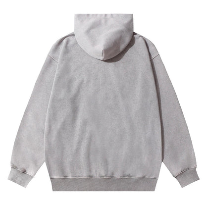 A premium cotton pullover hoodie with an embroidered letter patch in a variety of classic autumn colours