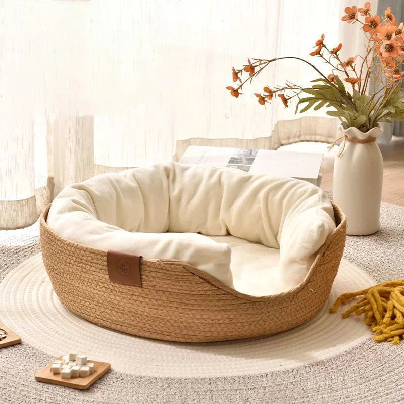 Handmade bamboo pet bed with removable cushion, designed for cosy relaxation of cats and small dogs