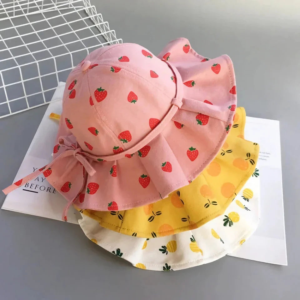 Adjustable cotton sun protection bucket hats for children with whimsical cartoon designs