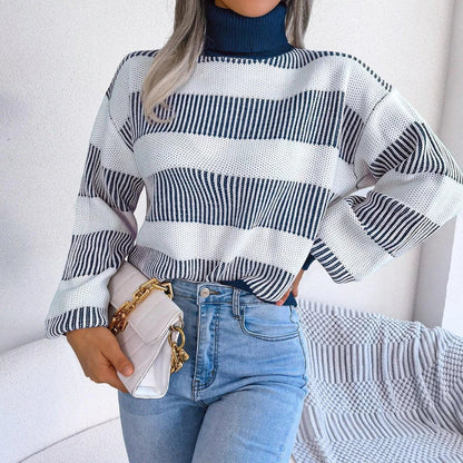 Cosy and stylish high-neck striped sweater in various colours, featuring lantern sleeves and a relaxed fit for all-day comfort.