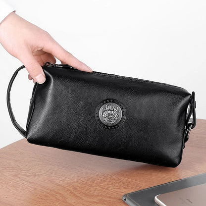 Premium leather clutch bag in a stylish business-casual design with a spacious interior and waterproof construction, perfect for discerning gentlemen on the go.