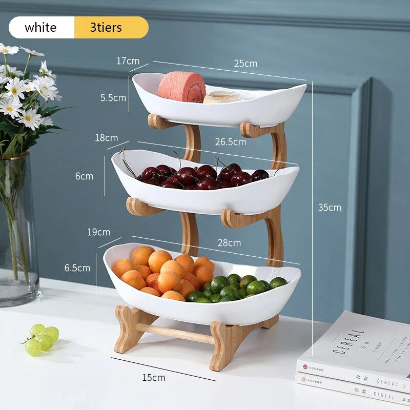 Elegant partitioned oval table plates and tiered fruit bowl with candy and cake trays, perfect for hosting and dining in the UK