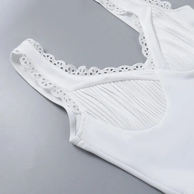 Elegant lace strap mini a-line dress in white with a flirty backless design and sleek fit