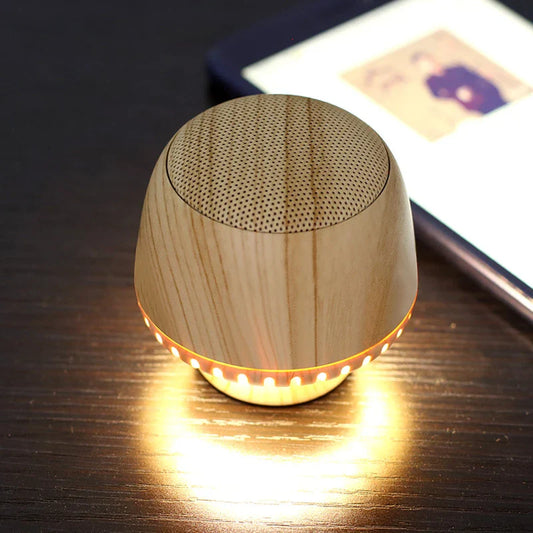 Compact wireless Bluetooth speaker with mushroom-inspired bionic design and night light function