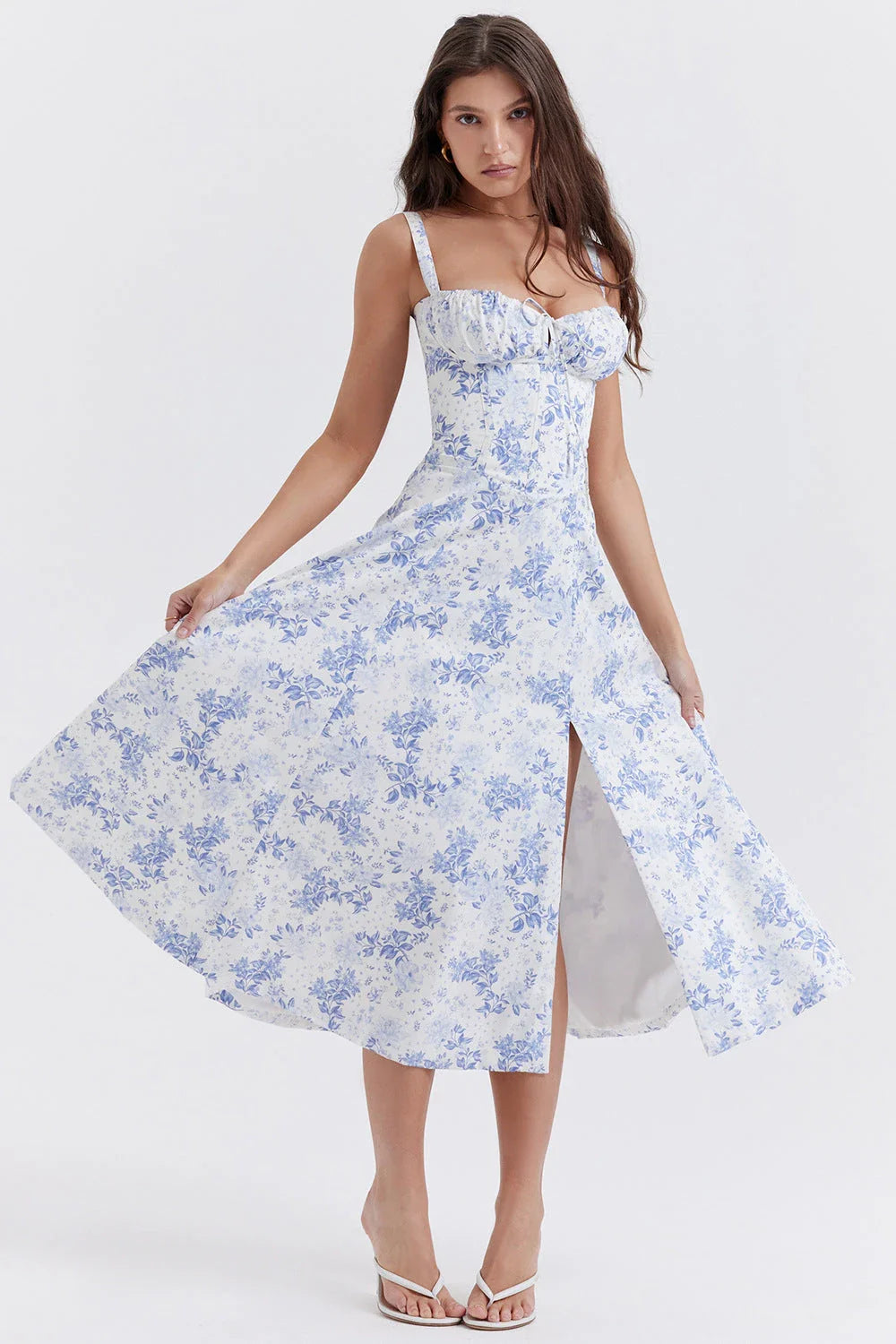 A stylish suspender dress made of premium polyester with a French high-split design, available in a range of vibrant solid colours for versatile summer wear.