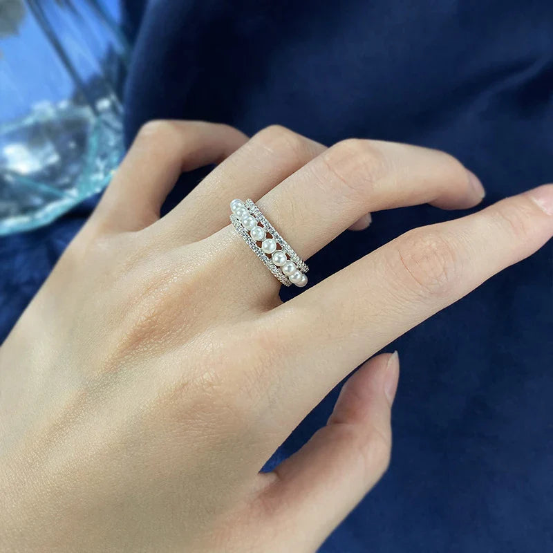 A beautiful 925 sterling silver ring with a delicate pearl accent, designed for the discerning British woman