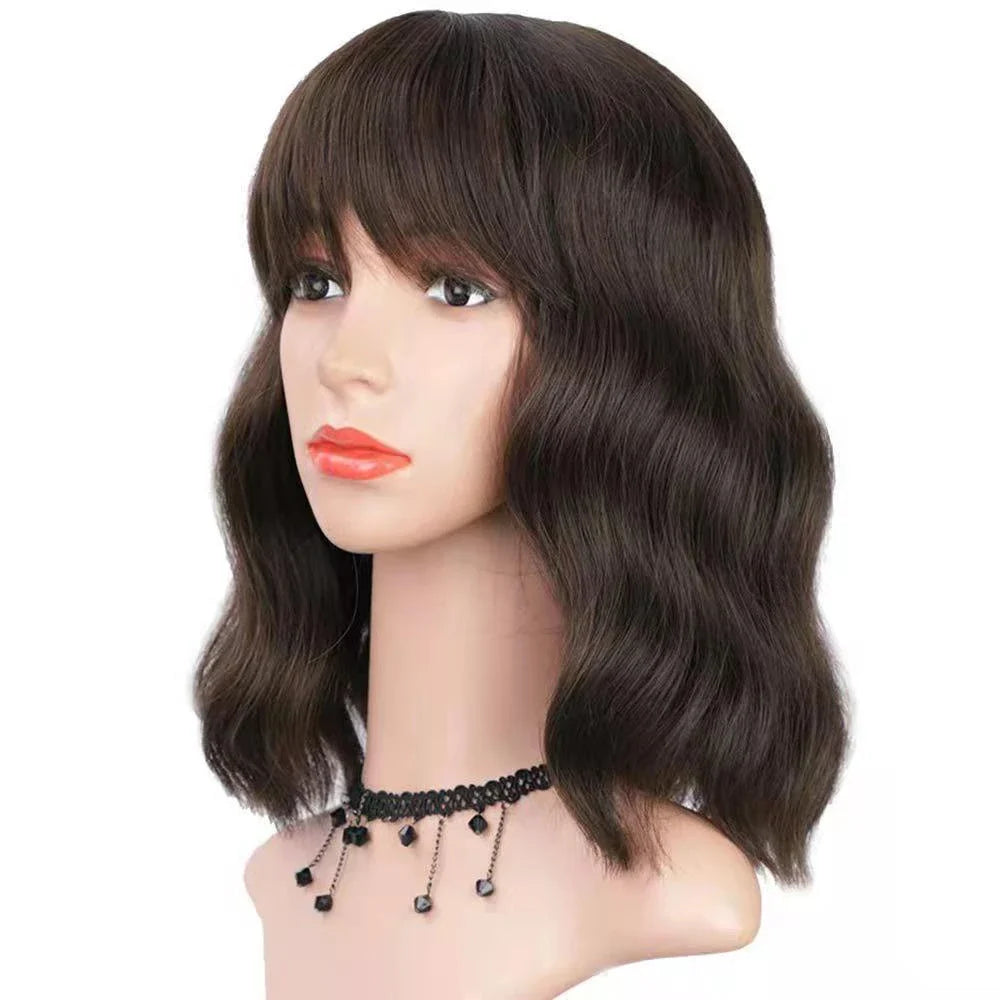 Elegant curly wig with soft bangs, crafted with high-quality fibres for a natural, long-lasting look in a variety of stunning colours.