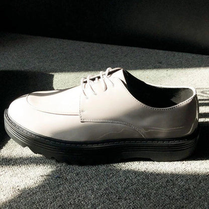 Premium microfiber leather casual shoes with thick rubber sole, low-top design, and striking Korean-inspired details