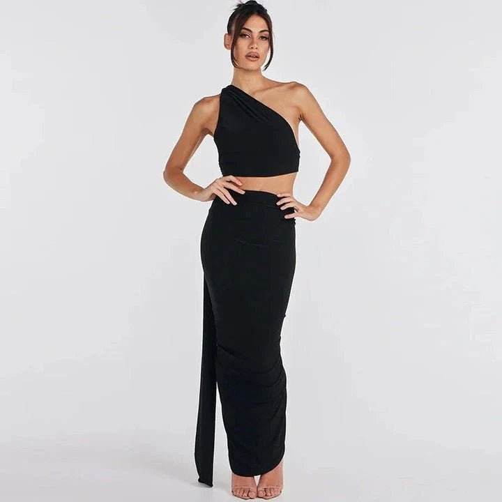 Elegant backless cocktail dress set with halter crop top and maxi skirt, perfect for summer events and occasions