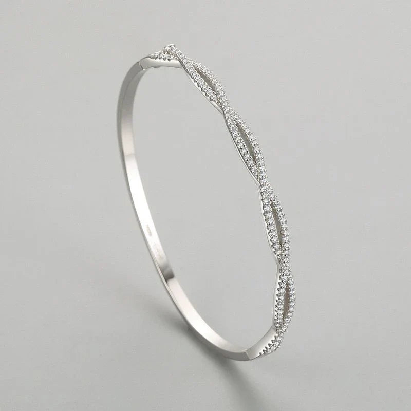 Silver bracelet with wave pattern, ideal for fashion-conscious women in the UK