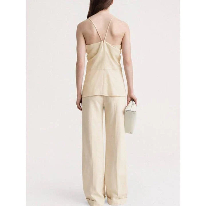 Elegant summer camisole with v-neck and backless design, made from soft viscose fabric for comfort and style