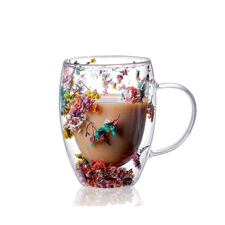 Elegant double-walled glass tea mug with a captivating floral design, ideal for hot and cold beverages