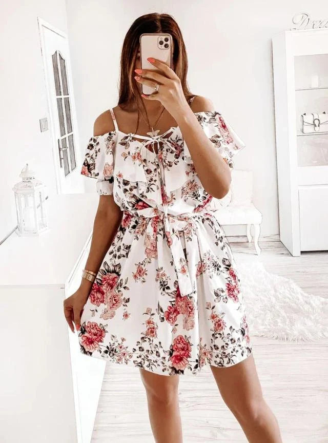 A stylish floral print dress with a flattering waist design, perfect for professional commuting