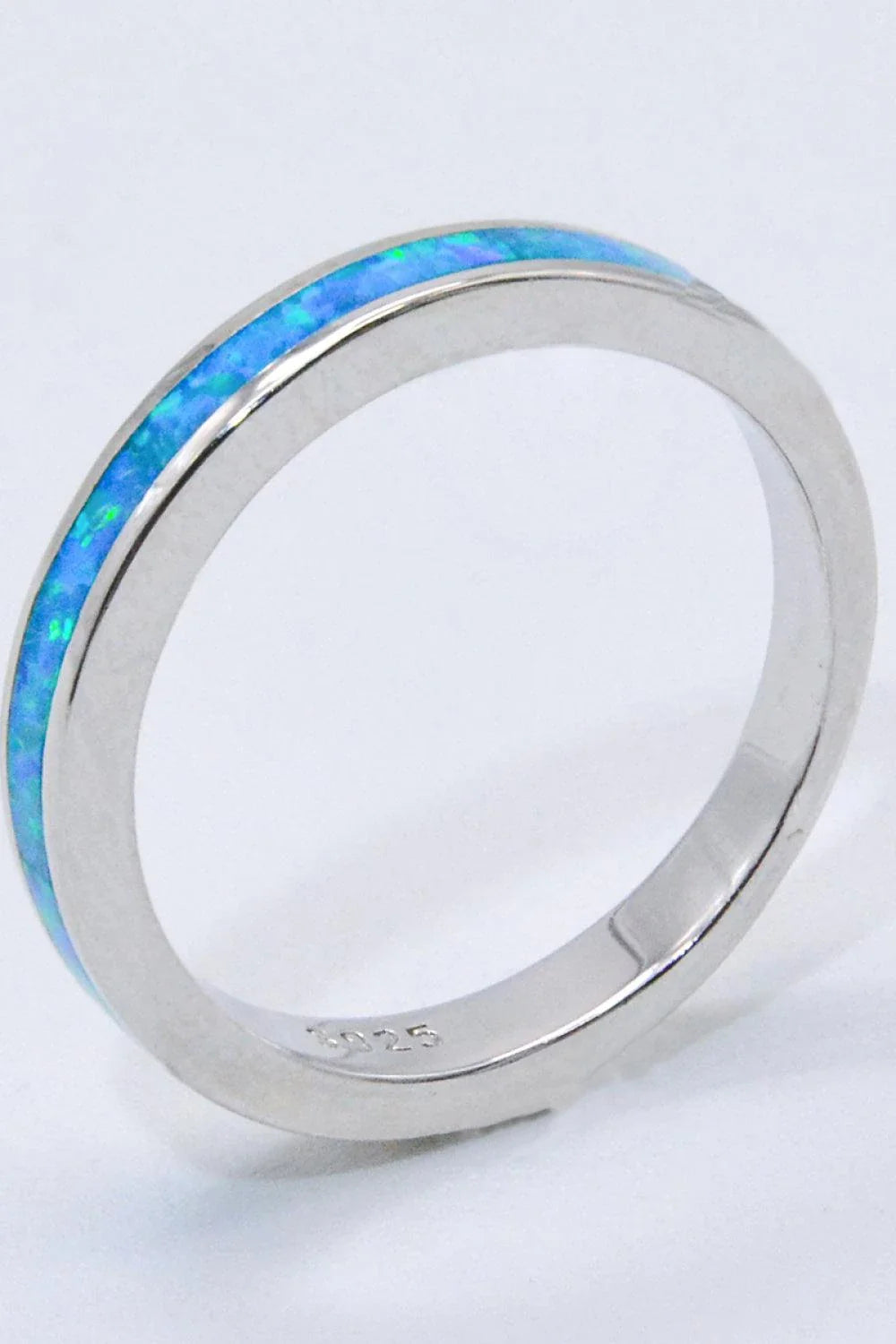 Elegant sterling silver ring with a mesmerizing sky blue opal gemstone, a modern and sophisticated accessory.