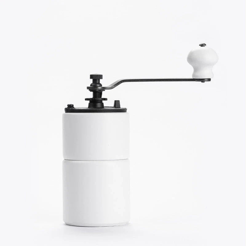 Elegant wooden manual coffee grinder with steel conical burr for consistent, flawless grinding