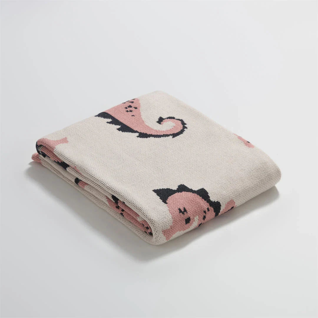 Cosy Sea Horse Cotton Throw Blanket in pink and lake blue colours, featuring a playful sea horse pattern and jacquard weave design.