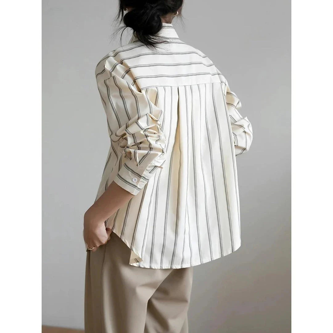 Elegant striped office blouse with chic drop shoulder design, made from premium polyester-cotton blend for durability and comfort