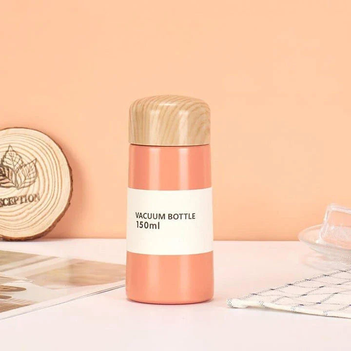 Elegant floral-patterned double-wall insulated water bottle with straw, perfect for keeping drinks chilled or warm for up to 12 hours