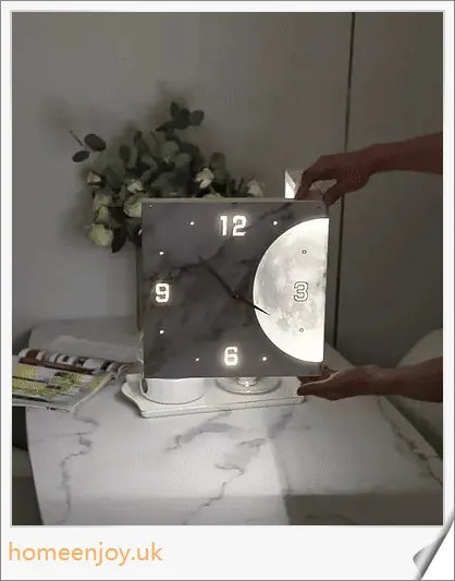 Elegant double-sided corner wall clock with acrylic construction and aluminium hands, providing a modern and minimalist aesthetic for British homes.
