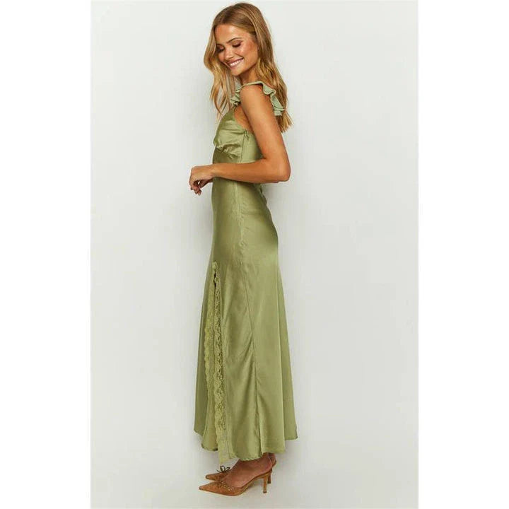 Elegant sleeveless ruffle maxi dress in green with backless design, made of premium silk and polyester blend