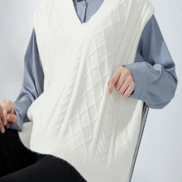 Cosy oversized knitted vest in various colours, featuring a sleeveless V-neck design for versatile layering