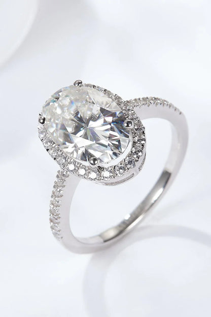 Elegant moissanite halo ring in polished sterling silver with a captivating 4.5-carat centre stone