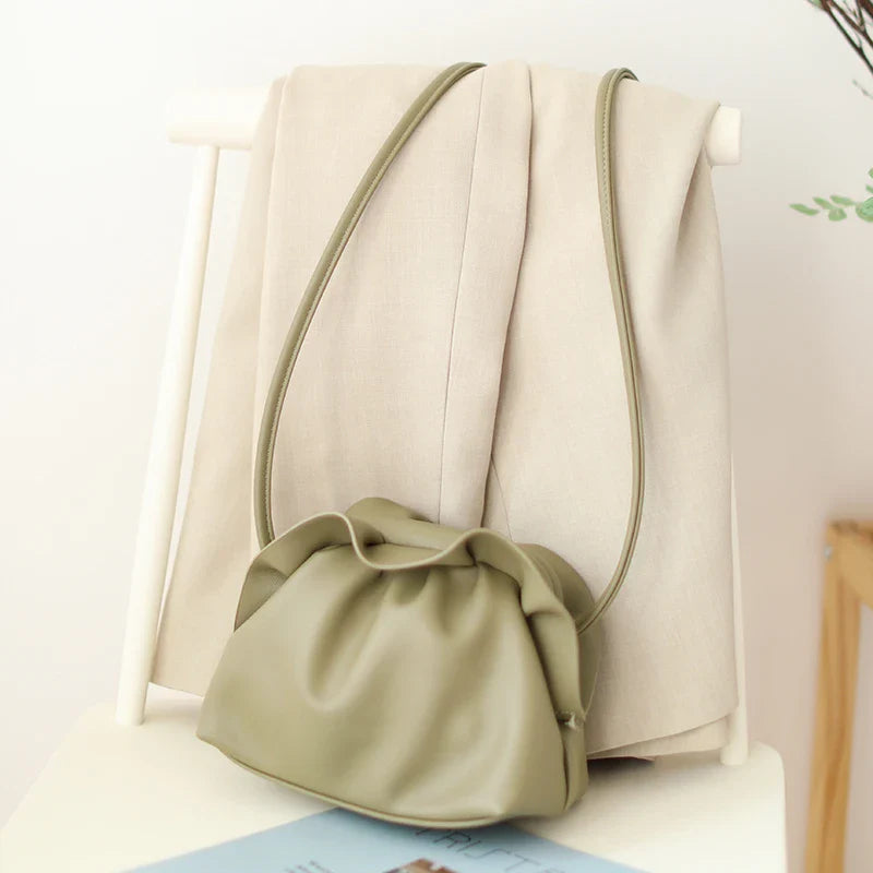 Chic retro dumpling bag made with soft, premium PU material in a one-shoulder diagonal design
