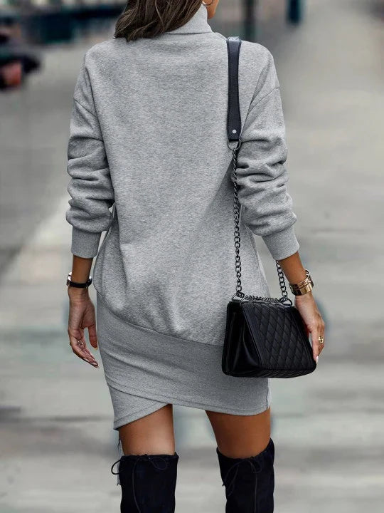 Elegant long sleeve midi dress in various colours, featuring a high neck design and waist cutout detail