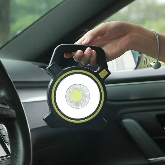 Portable USB-Rechargeable LED Work Lamp with bright LED beam, compact and lightweight design for easy portability, and USB charging capabilities