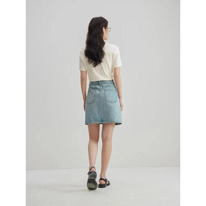 Chic high-waisted denim skirt in a classic blue shade, featuring an A-line silhouette and a flattering empire waistline.
