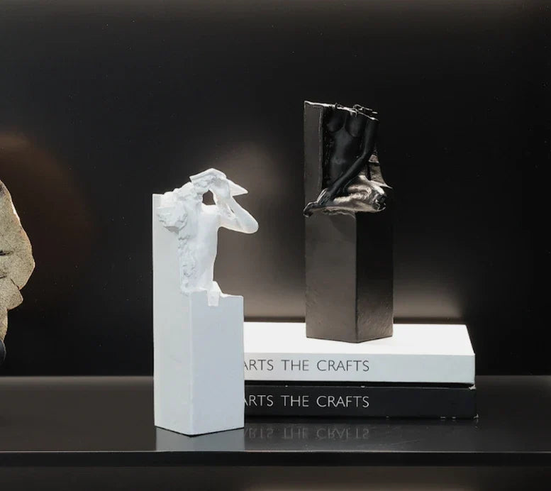 Elegant black and white abstract sculpture for desktop or study decor