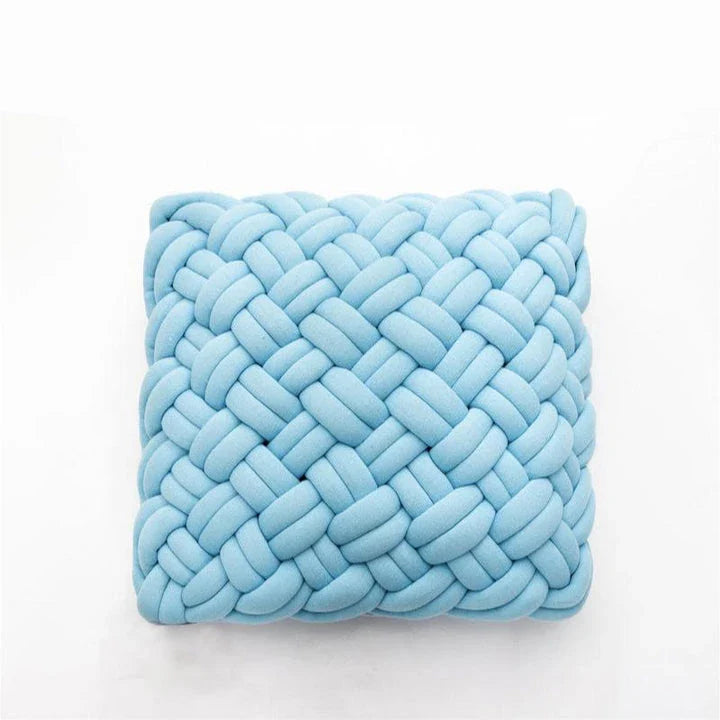 Handmade cotton throw pillow with unique knotted design in a sky blue colour