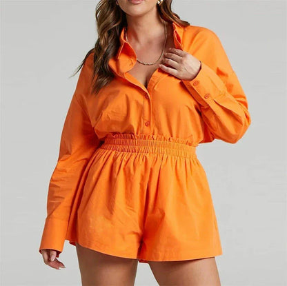 Chic high-waist cotton linen shirt and shorts set in pink, featuring a turn-down collar, long sleeves, and a relaxed, flattering fit for the modern British woman.