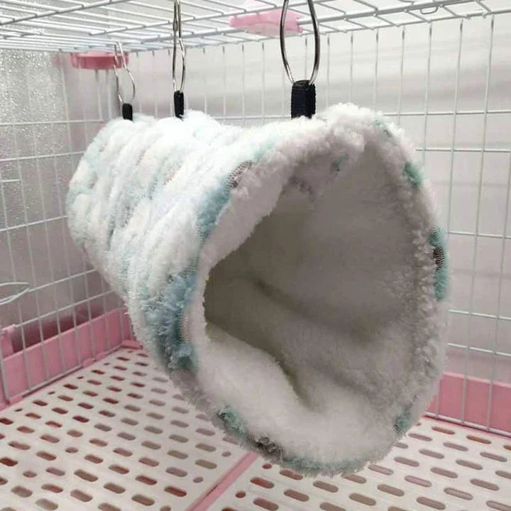 Cosy plush tunnel in grey for small pets like hamsters and guinea pigs, providing a comfortable and secure hideaway