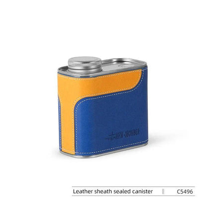 Airtight metal coffee and tea canister with portable filter paper storage, perfect for camping and home use