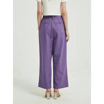 Elegant purple high-waisted wide-leg trousers with a vintage-inspired design, perfect for the modern British woman