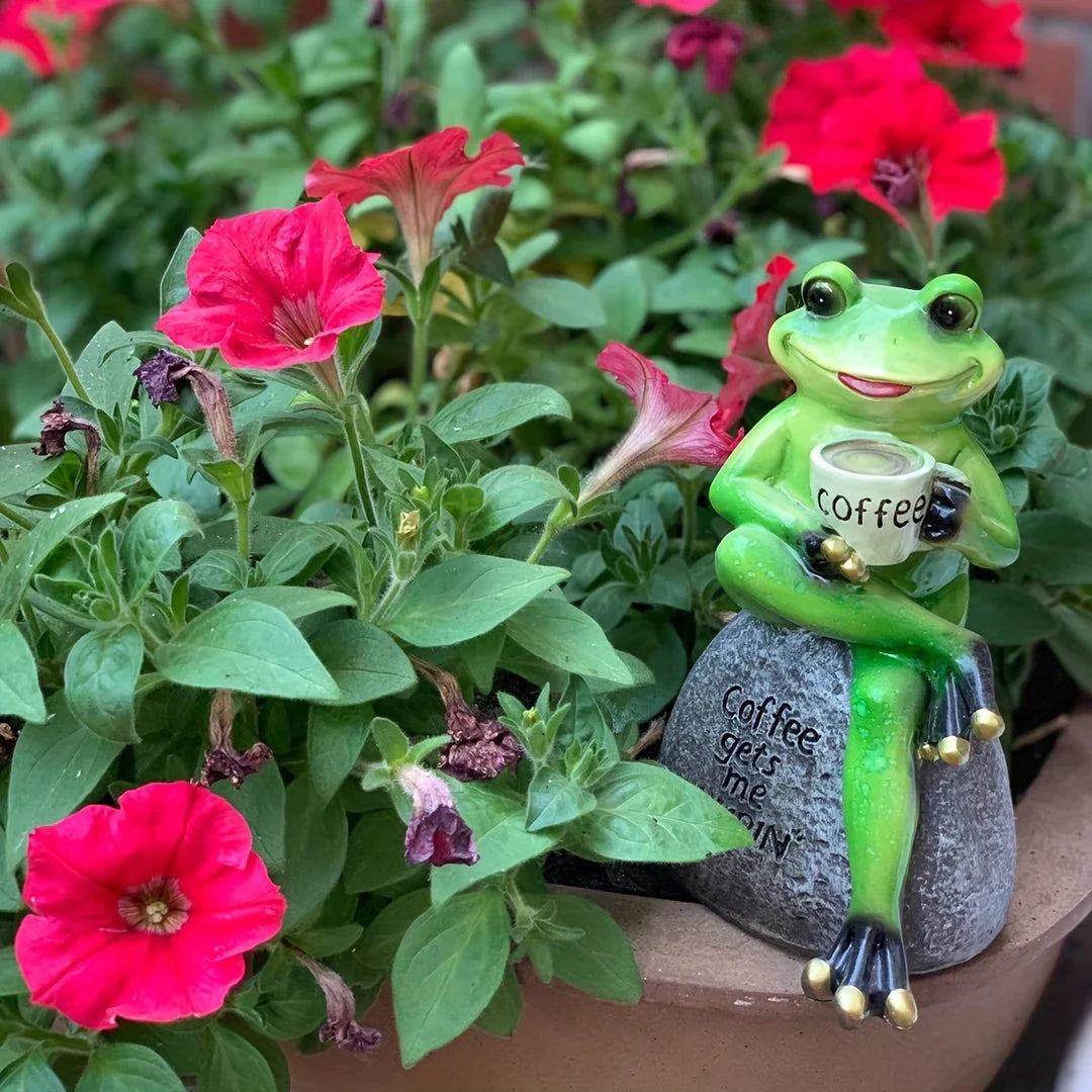 Charming resin frog statue with a playful design, perfect for enhancing the ambience of outdoor spaces