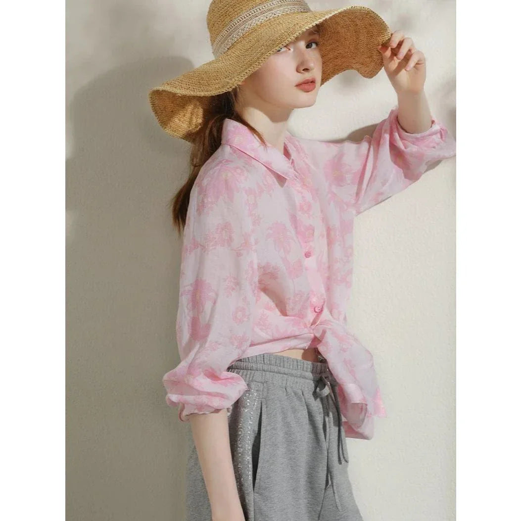 Elegant floral print ramie blouse for professional women, featuring a charming pattern, breathable fabric, and a polished silhouette.