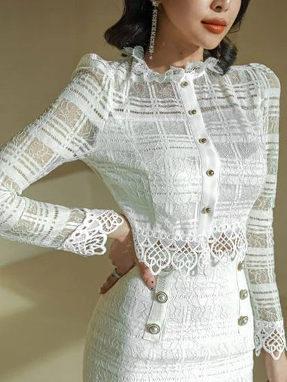 Elegant lace-trimmed two-piece suit with Chanel-inspired design and tailored stitching details