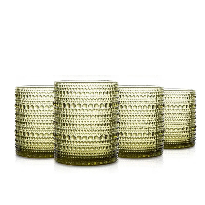 Set of 4 elegant retro-inspired drinking glasses with unique bead design and comfortable grip