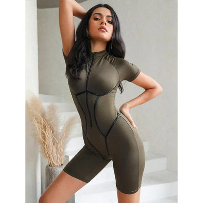 A high-quality polyester jumpsuit with a striped pattern and a zipper detail, perfect for autumn fashion.