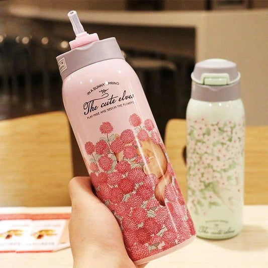 Elegant floral-patterned double-wall insulated water bottle with straw, perfect for keeping drinks chilled or warm for up to 12 hours