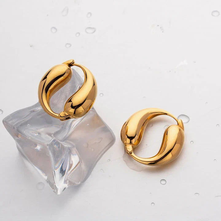Elegant 18K gold-plated stainless steel water drop earrings with a vintage-inspired O-shaped pendant